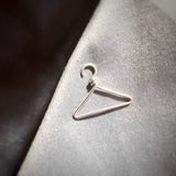 Pro-choice coat hanger lapel pin in sterling silver